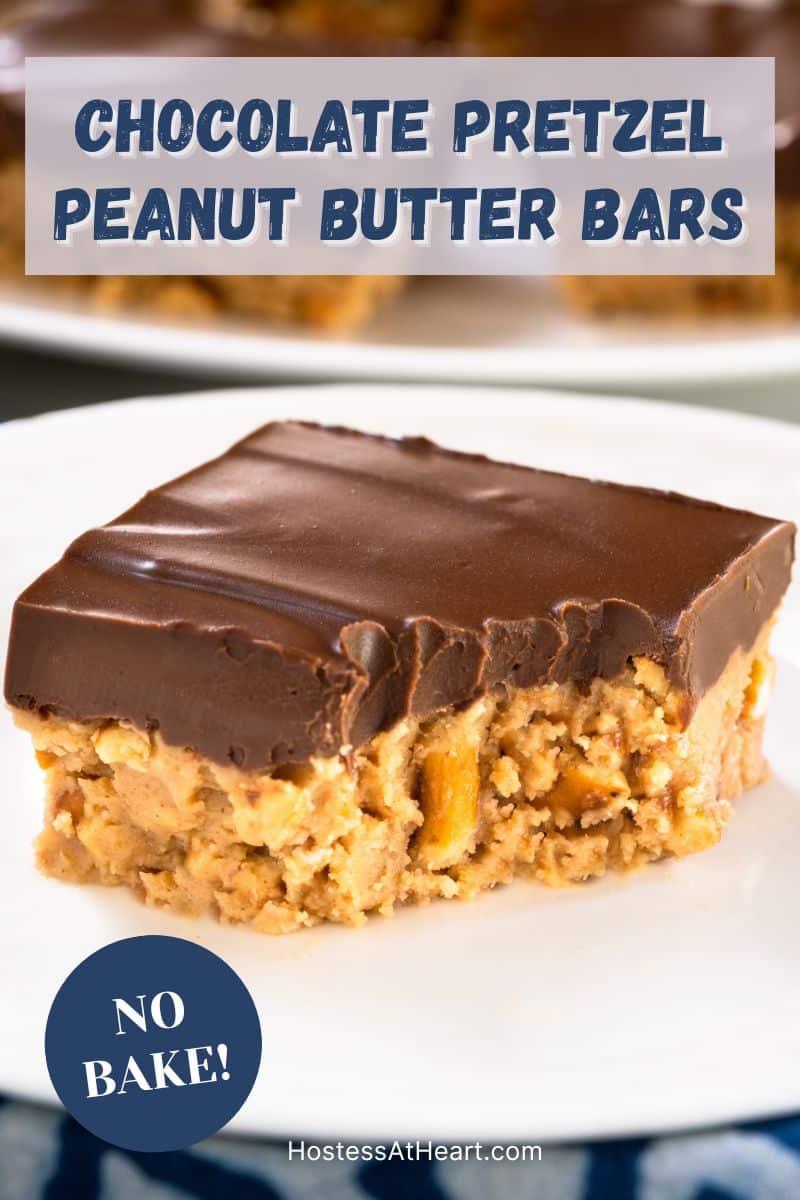 An image for Pinterest of a single peanut butter pretzel bar on white plate with chocolate topping and a bite taken out of it - Hostess At Heart
