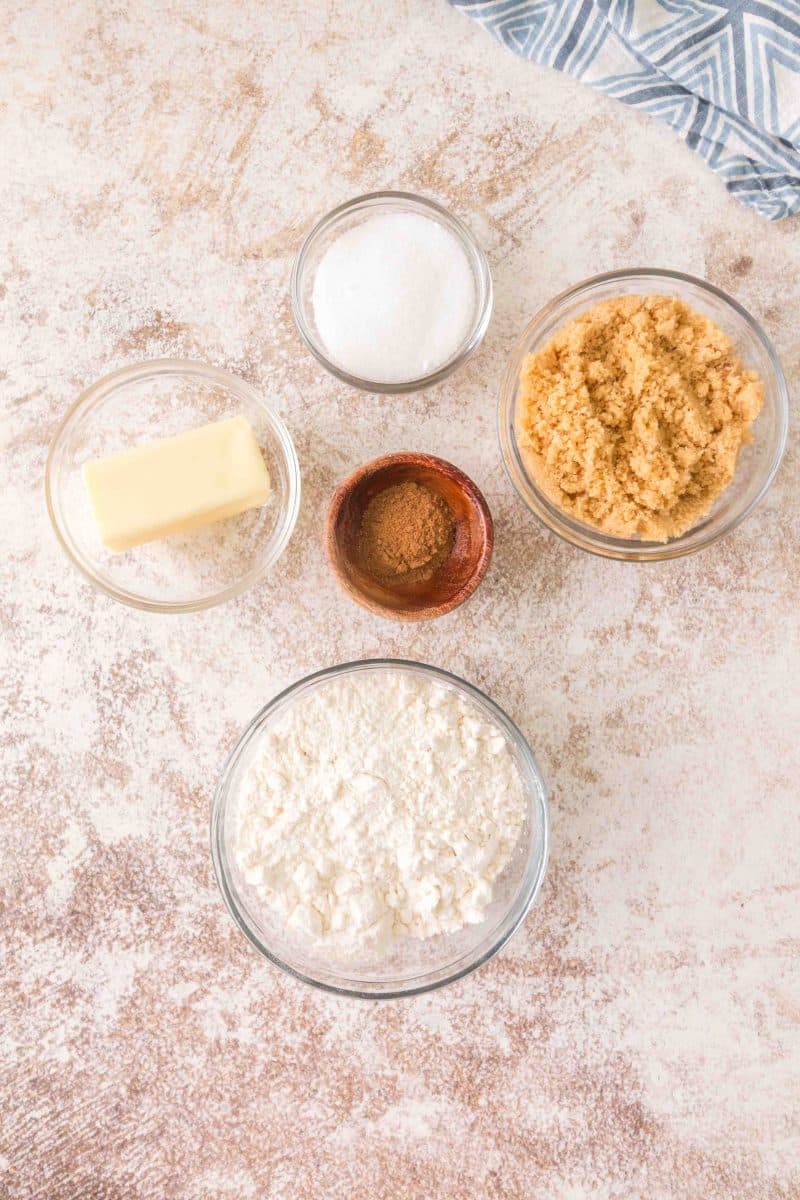 Crumble topping ingredients including brown sugar, butter, cinnamon, white sugar, and flour - Hostess At Heart