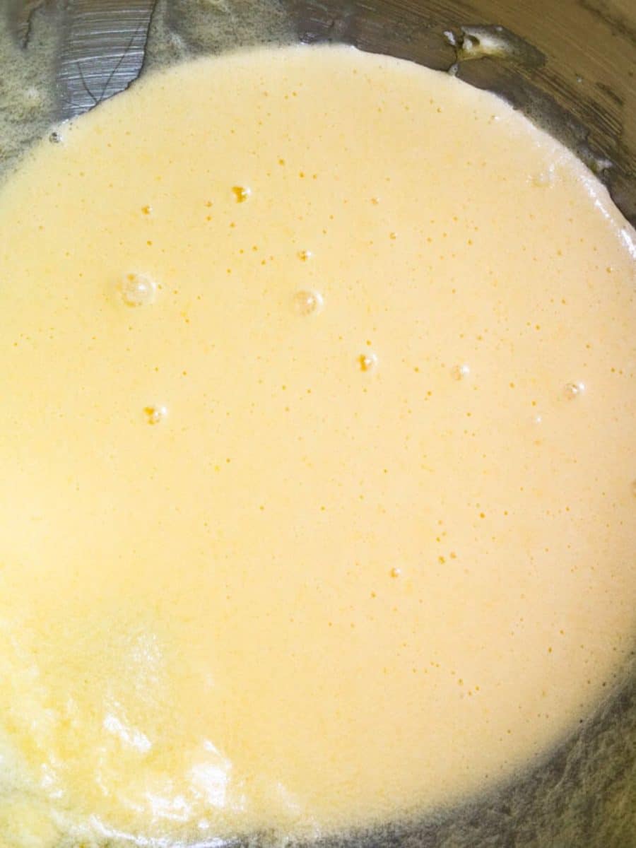 Top down view of creamy wet ingredients used to make Grandma's Oatmeal Raisin Cookies - Hostess At Heart