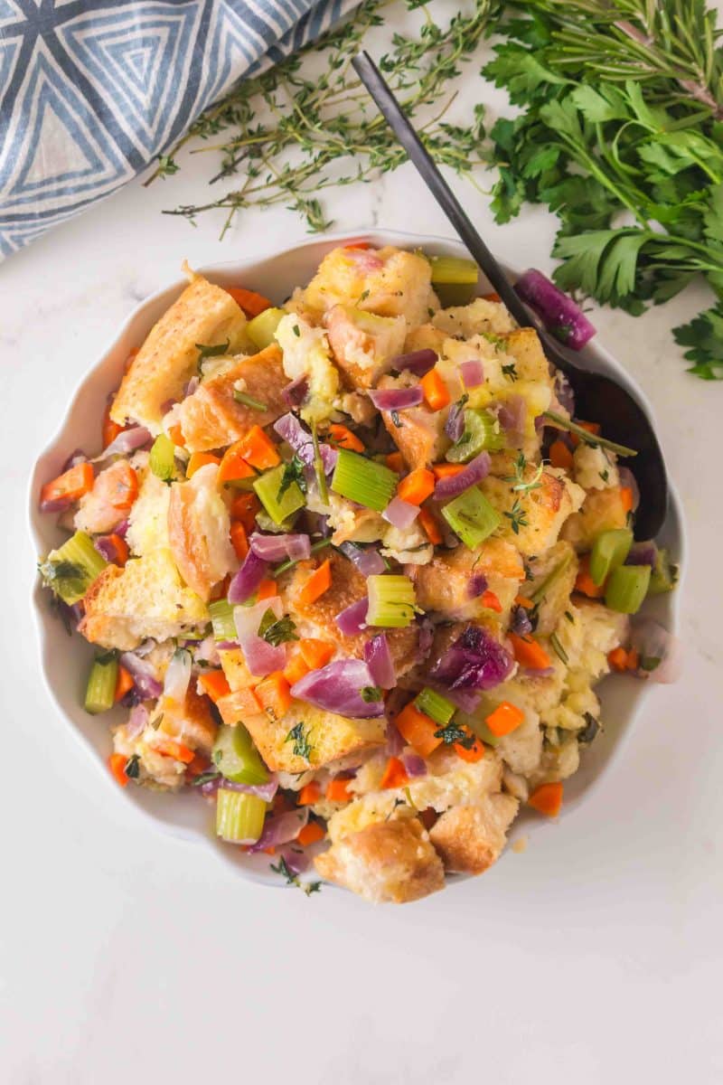 Top down view of a bowl filled with sourdough thanksgiving dressing - Hostess At Heart