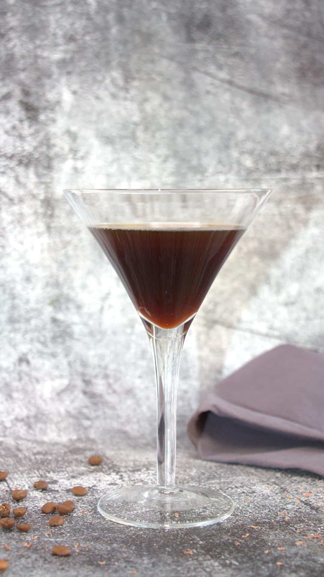 Sideview of a Chocolate espresso martini in a chilled martini glass - Hostess At Heart
