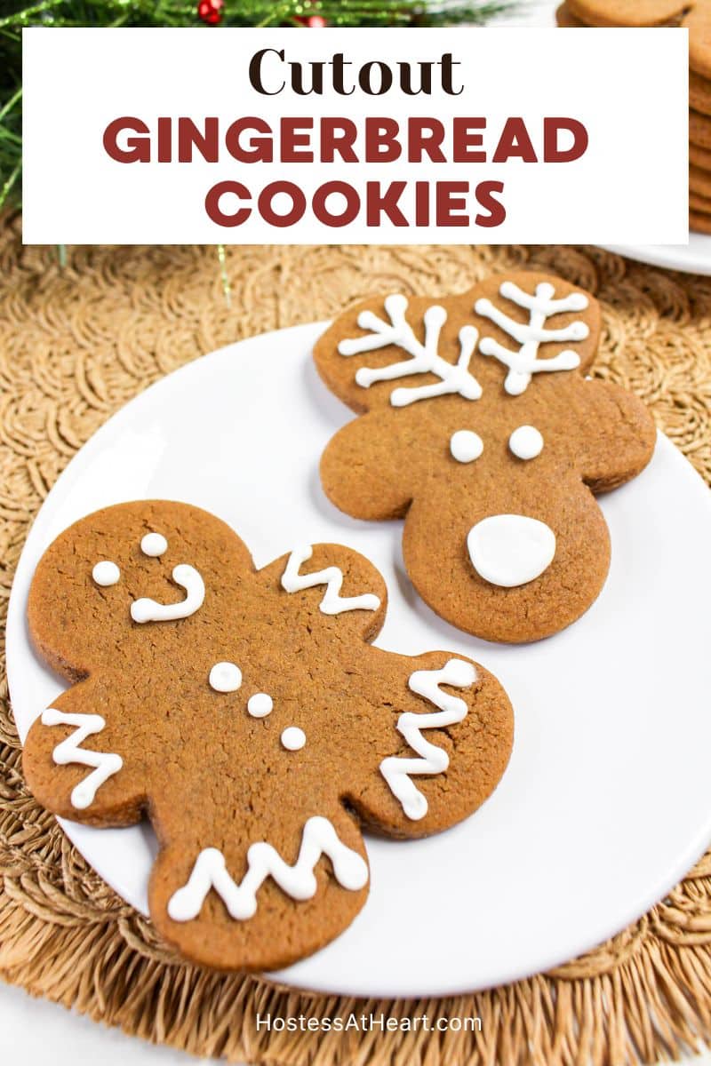 An image for pinterest of a plate holding a cut out gingerbread cookie man and a gingerbread reindeer - Hostess At Heart