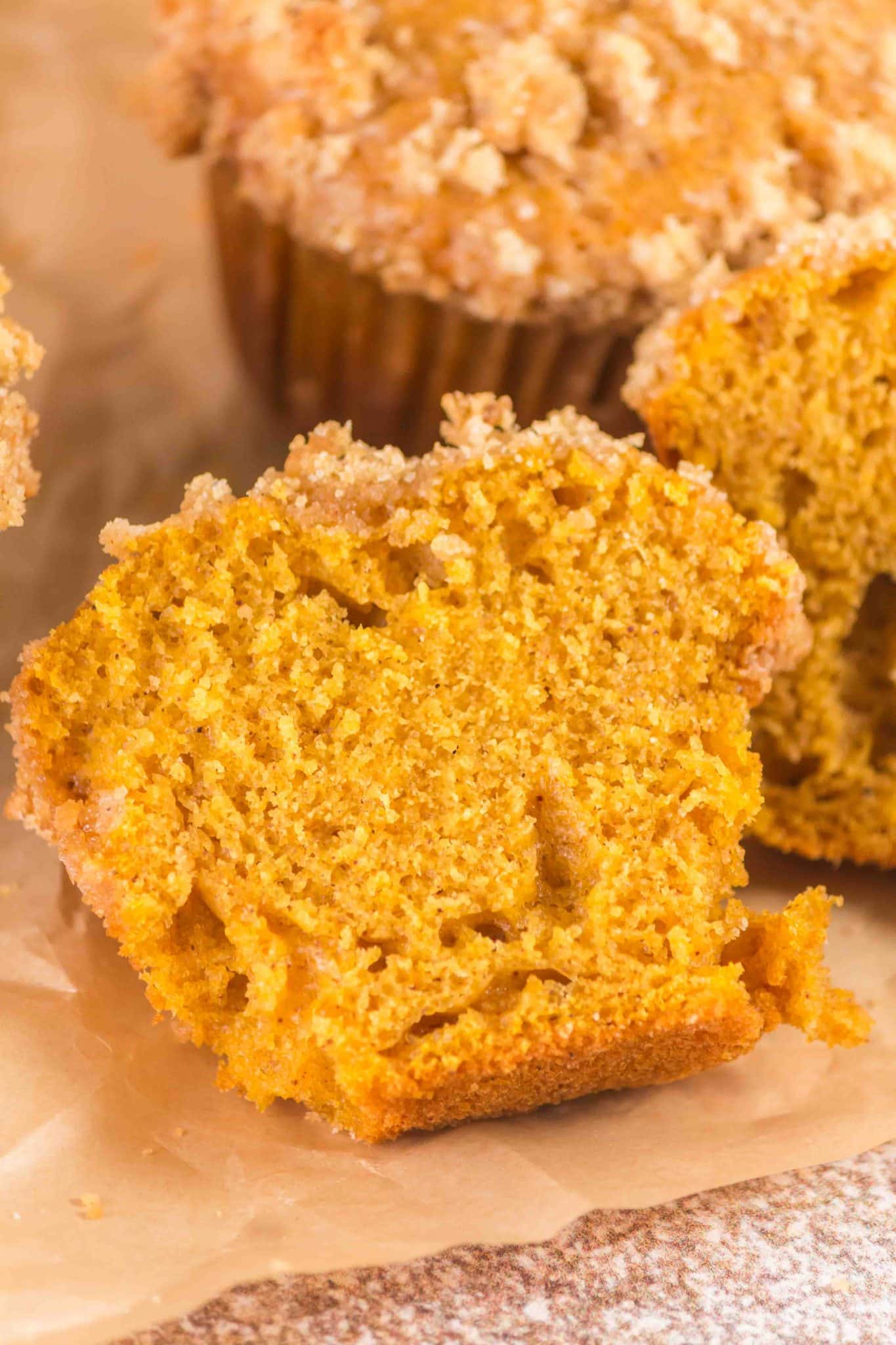 Muffin cut apart a warm sourdough pumpkin muffin showing the steamy moist interior - Hostess At Heart