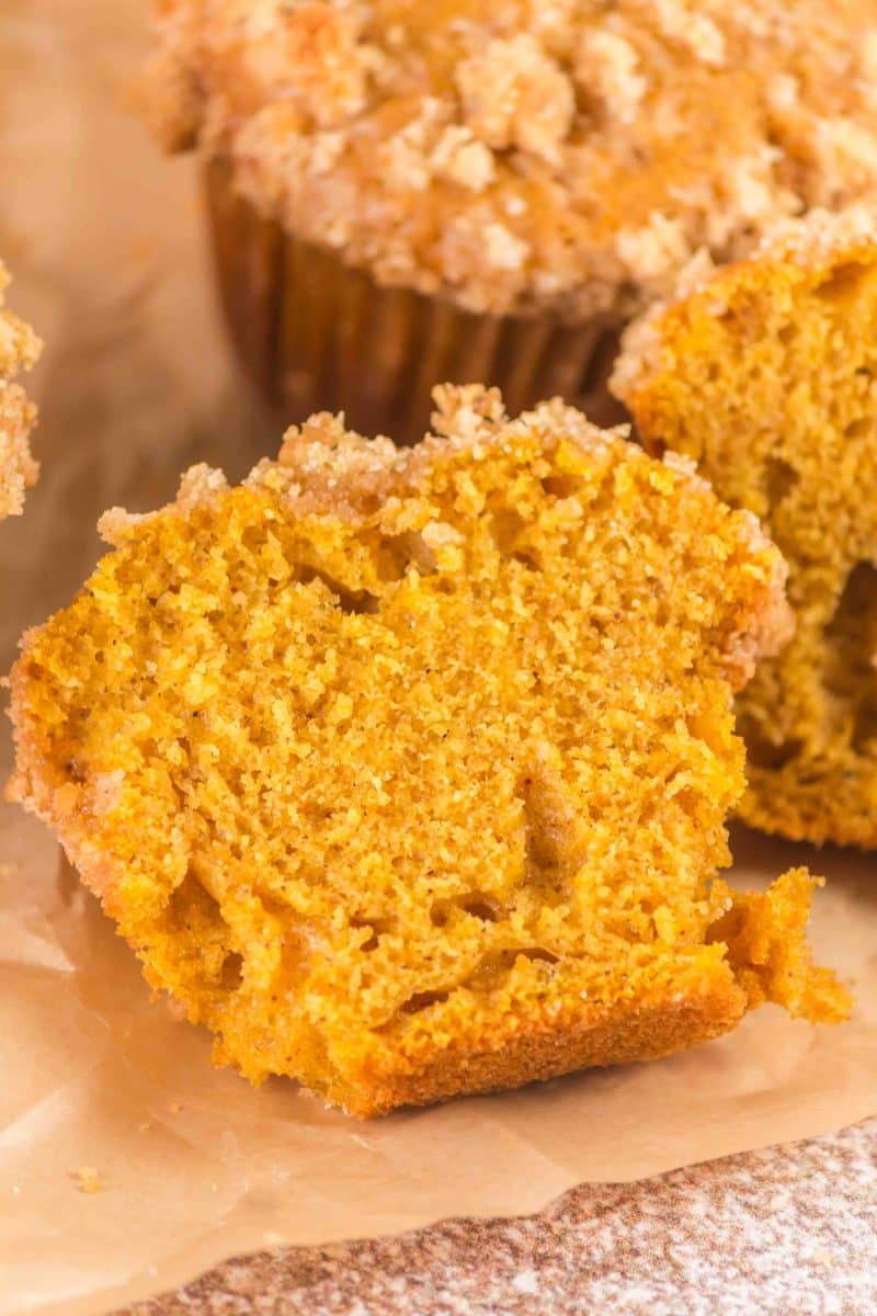 Muffin cut apart a warm sourdough pumpkin muffin showing the steamy moist interior - Hostess At Heart