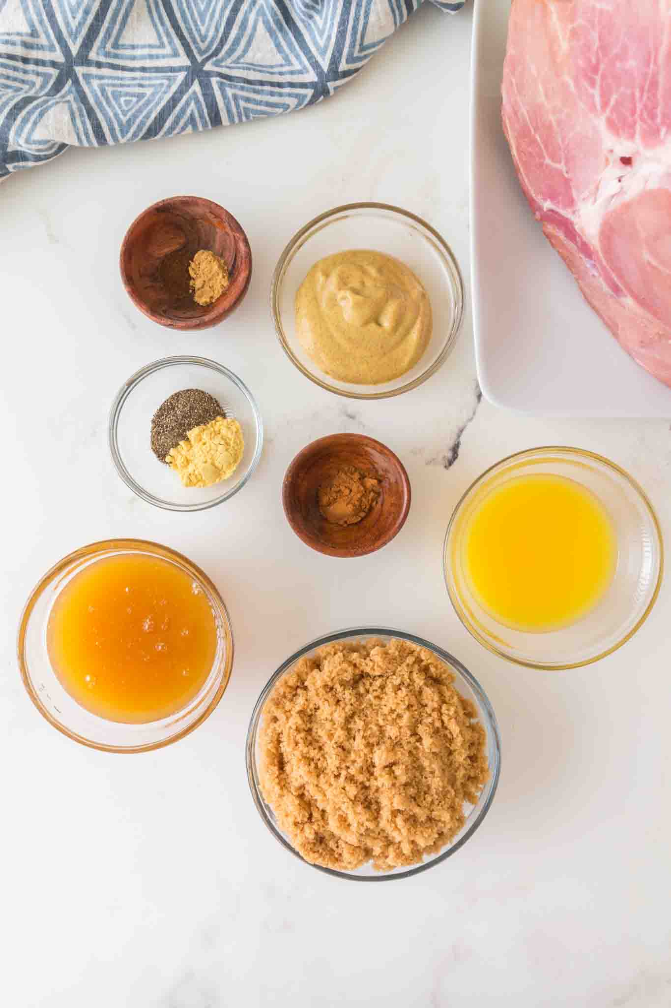Glazed Ham Ingredients: brown sugar, orange juice, honey, mustard, cinnamon, pepper, ginger, and cloves. Hostess At Heart