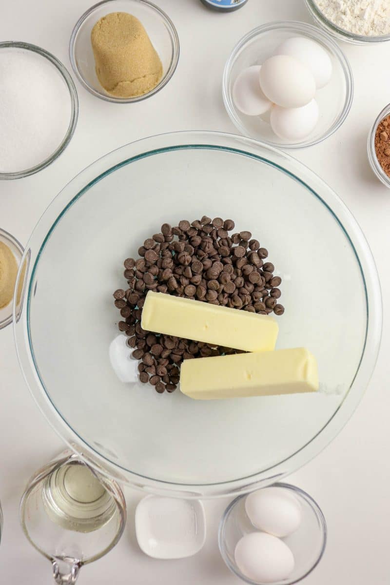 Butter and chocolate chips in a glass mixing bowl - Hostess At Heart