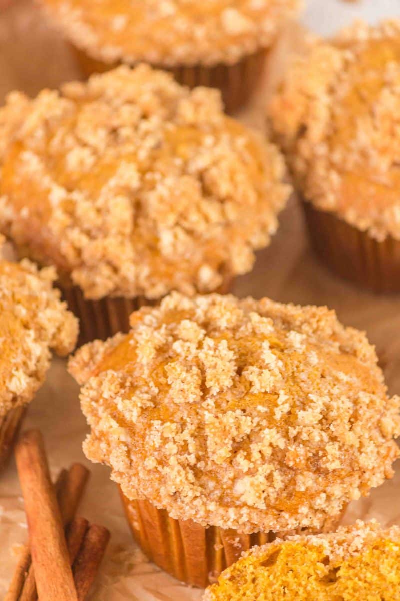 Angled overhead view of sourdough discard pumpkin muffins with crunchy brown sugar crumble topping - Hostess At Heart