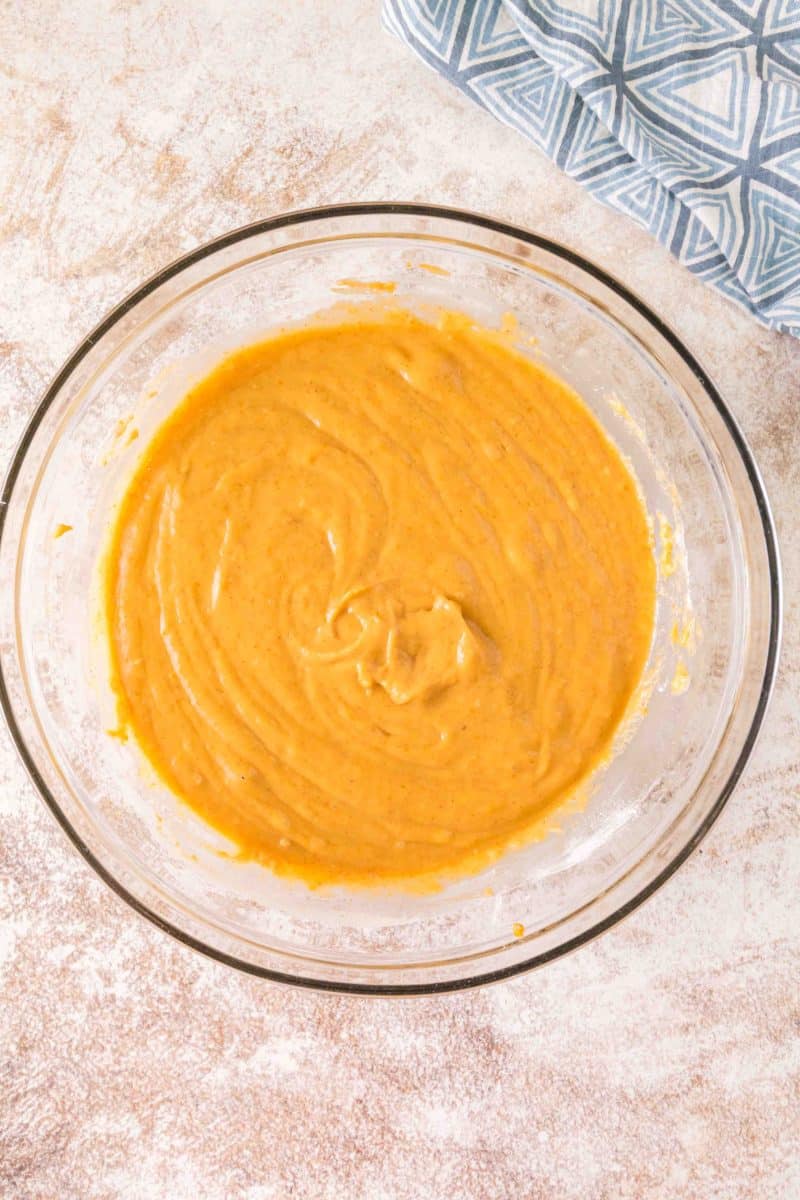 Smooth pumpkin muffin batter with sourdough discard ready to scoop into muffin tins - Hostess At Heart