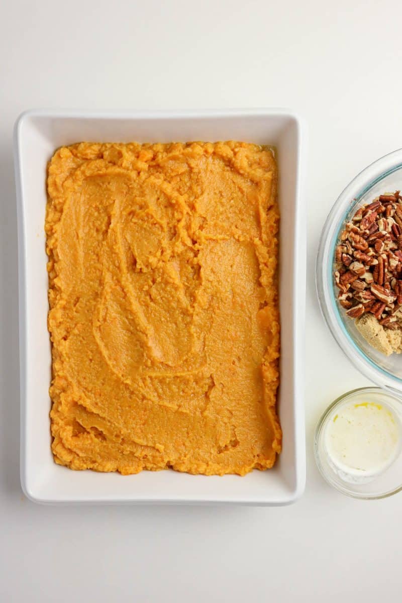 Sweet potato mixture spread evenly in a greased 9x13 inch baking dish - Hostess At Heart
