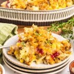 Close up of Thanksgiving Leftover Casserole showing layers of turkey, cranberry sauce, mashed potatoes, and stuffing - Hostess At Heart