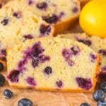 Moist slices of blueberry lemon sourdough bread with visible berries. Hostess At Heart