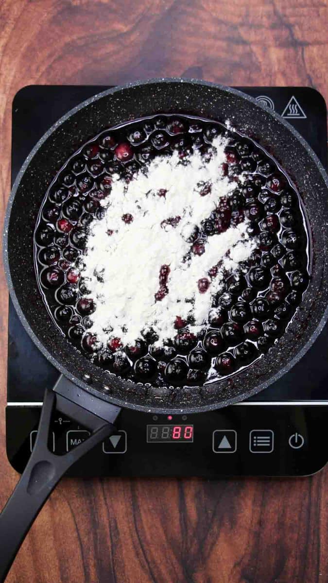 Flour added to a skillet of cooked blueberries in order to thicken it into a filling. Hostess At Heart