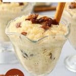 An image for Pinterest of a sideview of creamy instant pot rice pudding topped with cinnamon and raisins in a dessert cup - Hostess At Heart