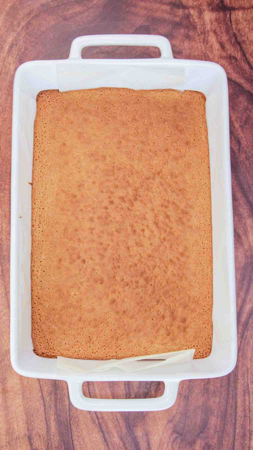 The bottom brownie layer baked in a 9x13 before covering with a praline topping. Hostess At Heart