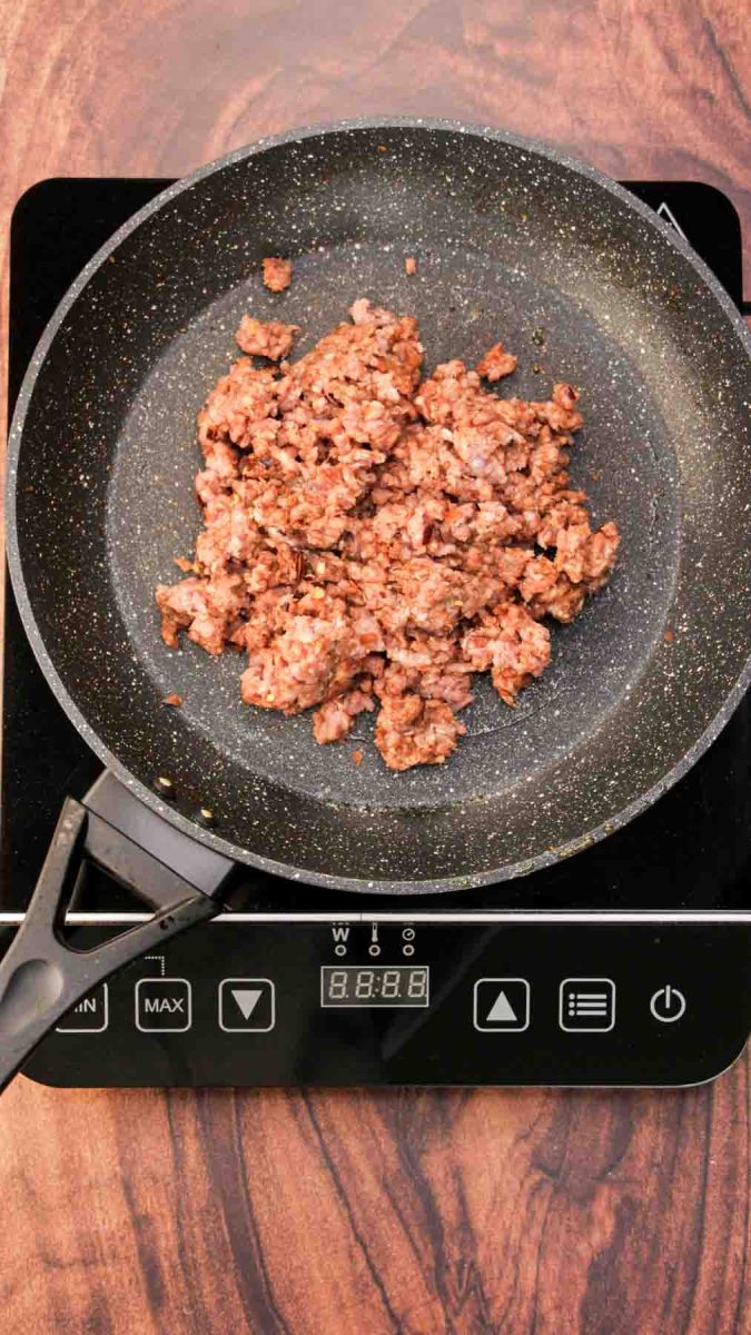 Raw breakfast in a skillet preparing to be browned - Hostess At Heart