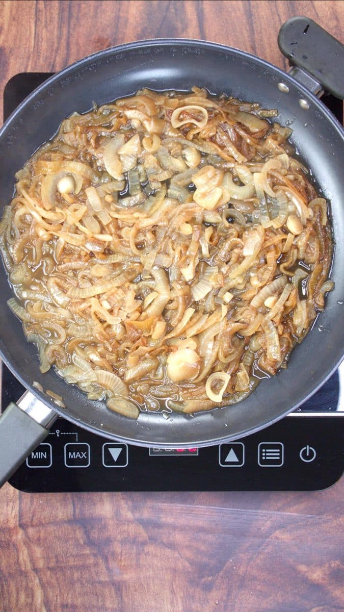 Onions cooking in a skillet. Hostess At Heart