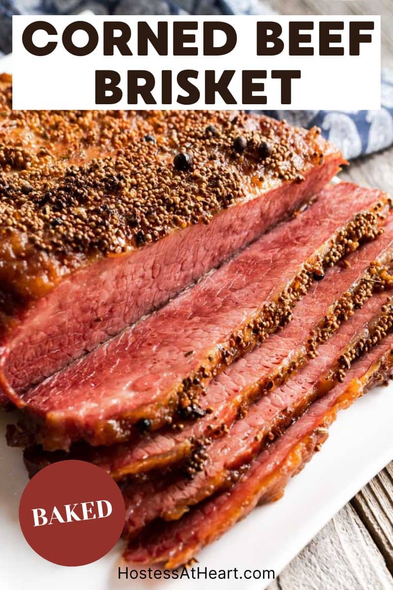 Angled view of a baked corned beef brisket that's been partially sliced. Hostess At Heart