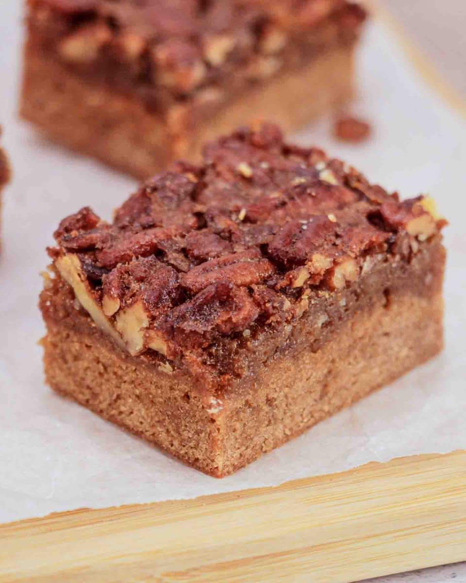 Closeup tableview of a Derby pie brownie showing layers - best Kentucky Derby desserts recipe - Hostess At Heart