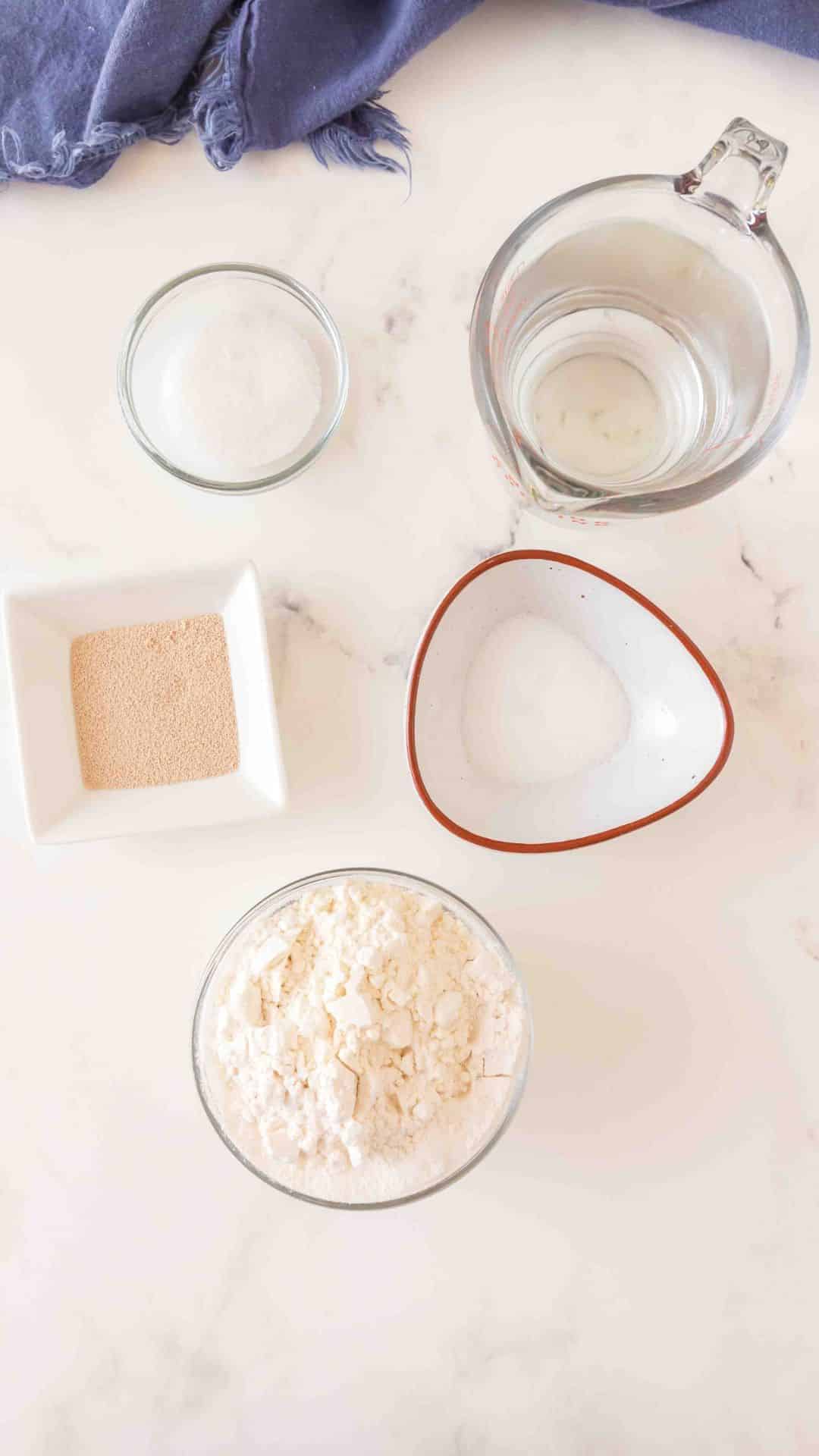 Bagel recipe ingredients including: yeast, flour, salt, water and sugar. Hostess At Heart