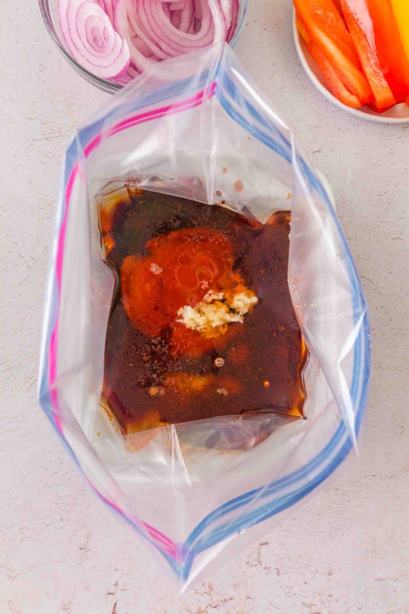A ziplock bag filled with honey garlic marinade ingredients - Hostess At Heart