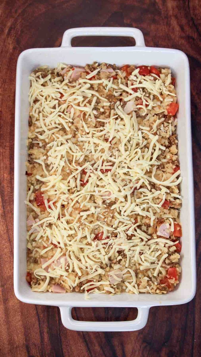 Unbaked breakfast casserole in 9x13 pan ready for oven - Hostess At Heart