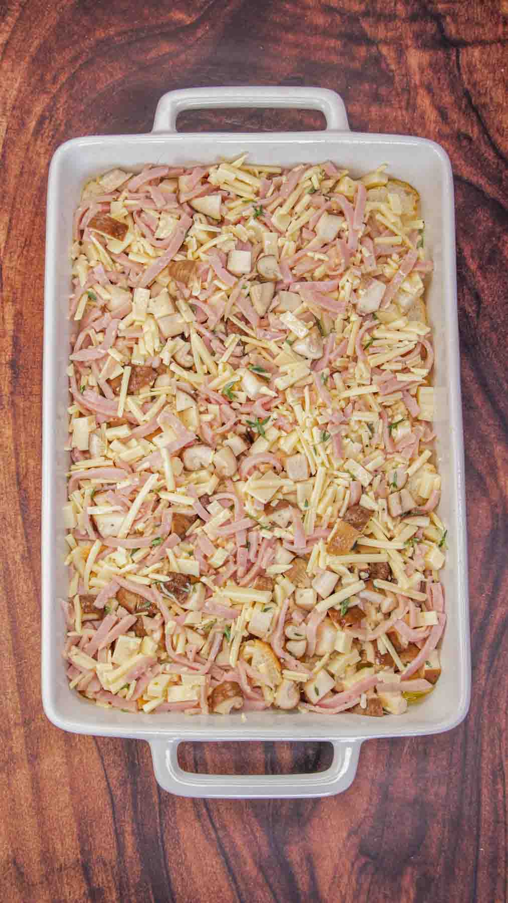 Assembled breakfast strata ready to refrigerate overnight. Hostess At Heart