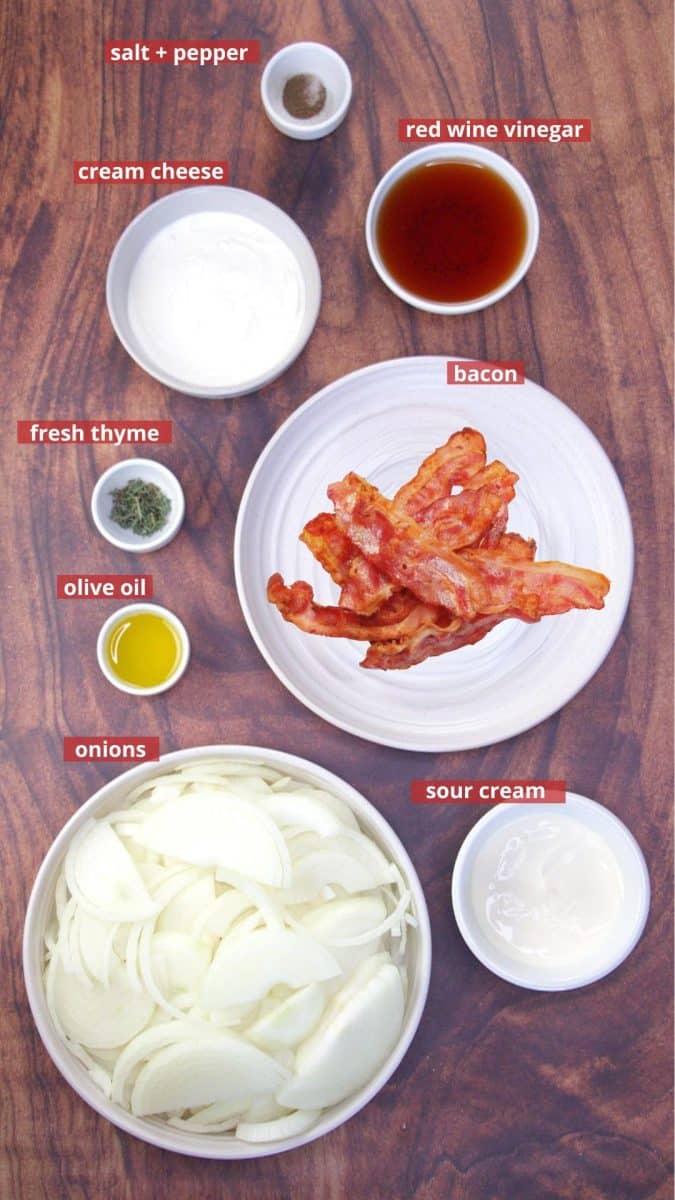Ingredients to make Onion Bacon Dip including crispy bacon, onions, sour cream, cream cheese, thyme, red wine vinegar, and salt and pepper. Hostess At Heart