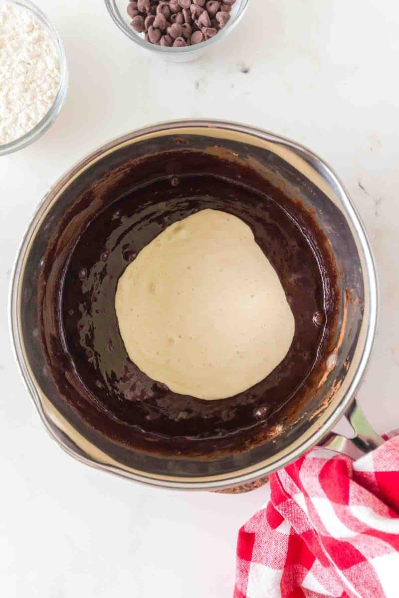 Folding sourdough discard into chocolate brownie batter. Hostess At Heart
