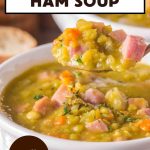 An image for Pinterest of split pea and leftover ham soup on a spoon showing the thick, creamy consistency with a chunk of ham - Hostess At Heart