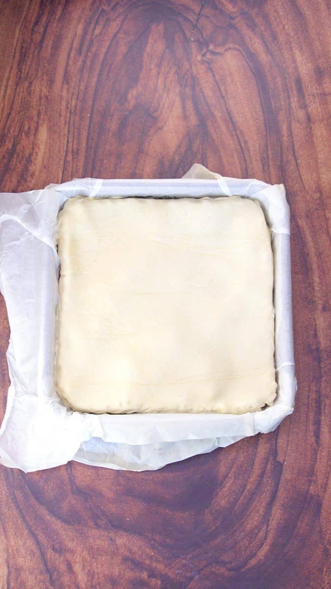 Top pie crust added over the top of strawberry filling. Hostess At Heart