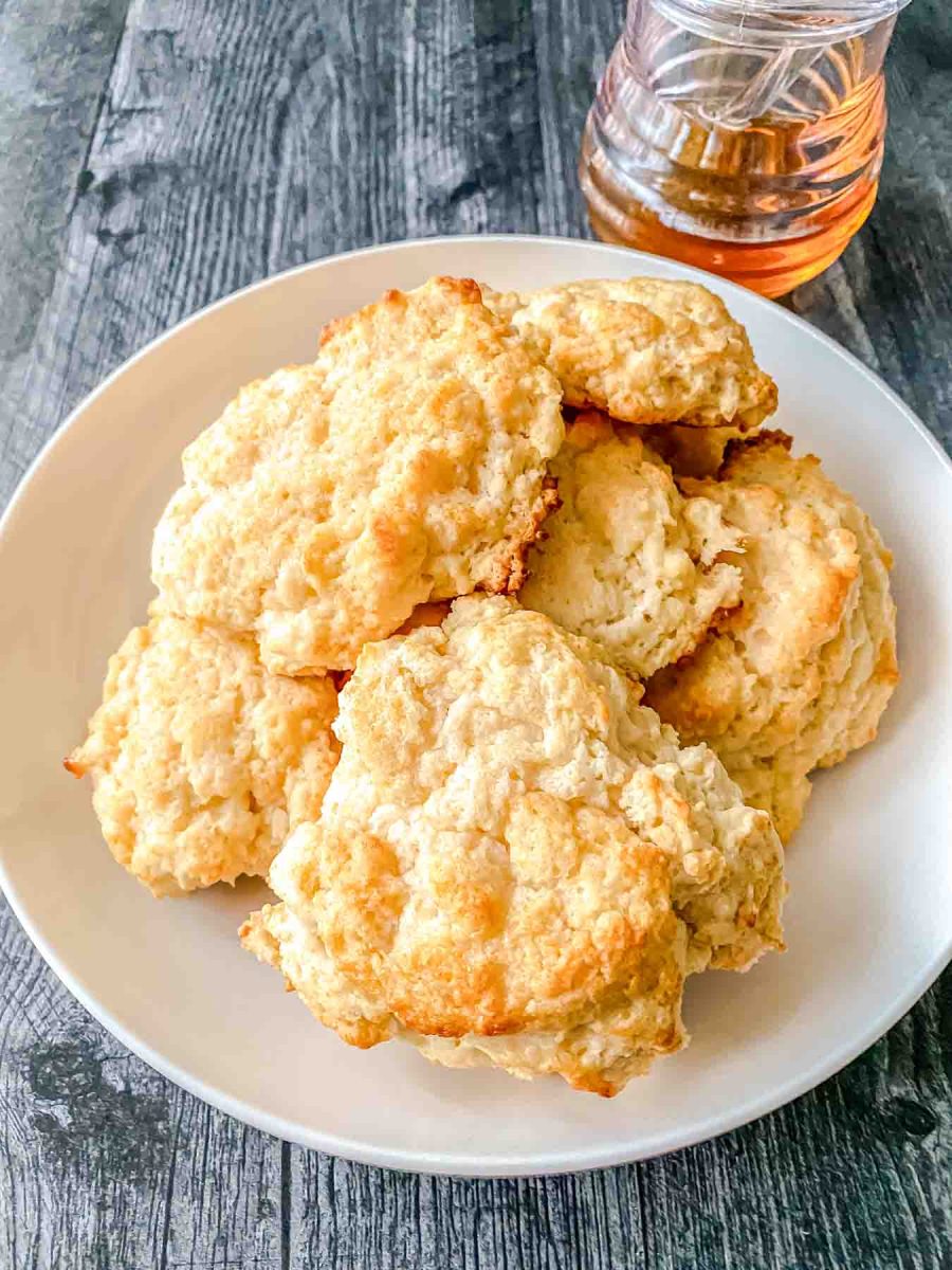 A large bowl filled with golden brown quick drop biscuits - Hostess At Heart