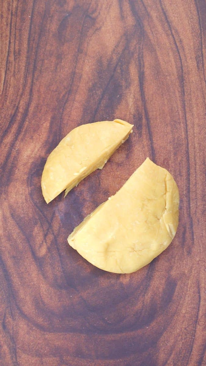 A round of pie dough with 1/2 sliced to be used for the top crust. Hostess At Heart