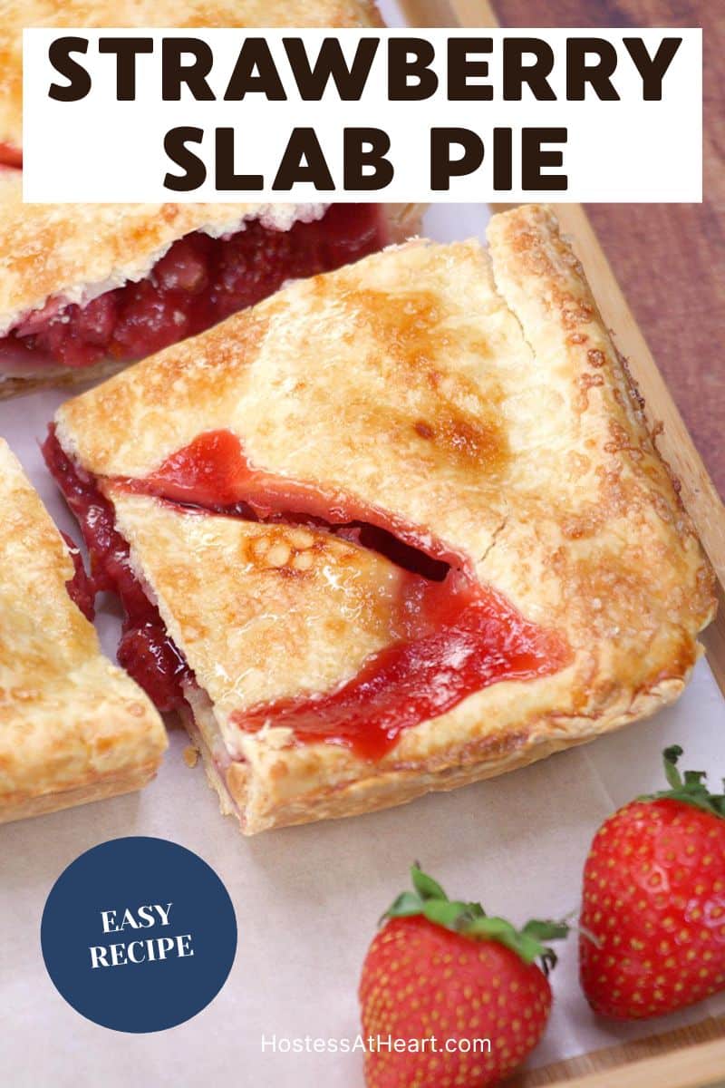 A top down view of a slice of easy slab pie with strawberry filling oozing out of the top crust. Hostess At Heart