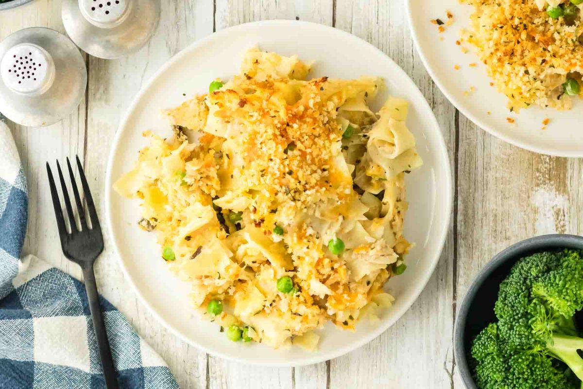 Top down view of a white plate filled with a serving of easy tuna casserole - Hostess At Heart