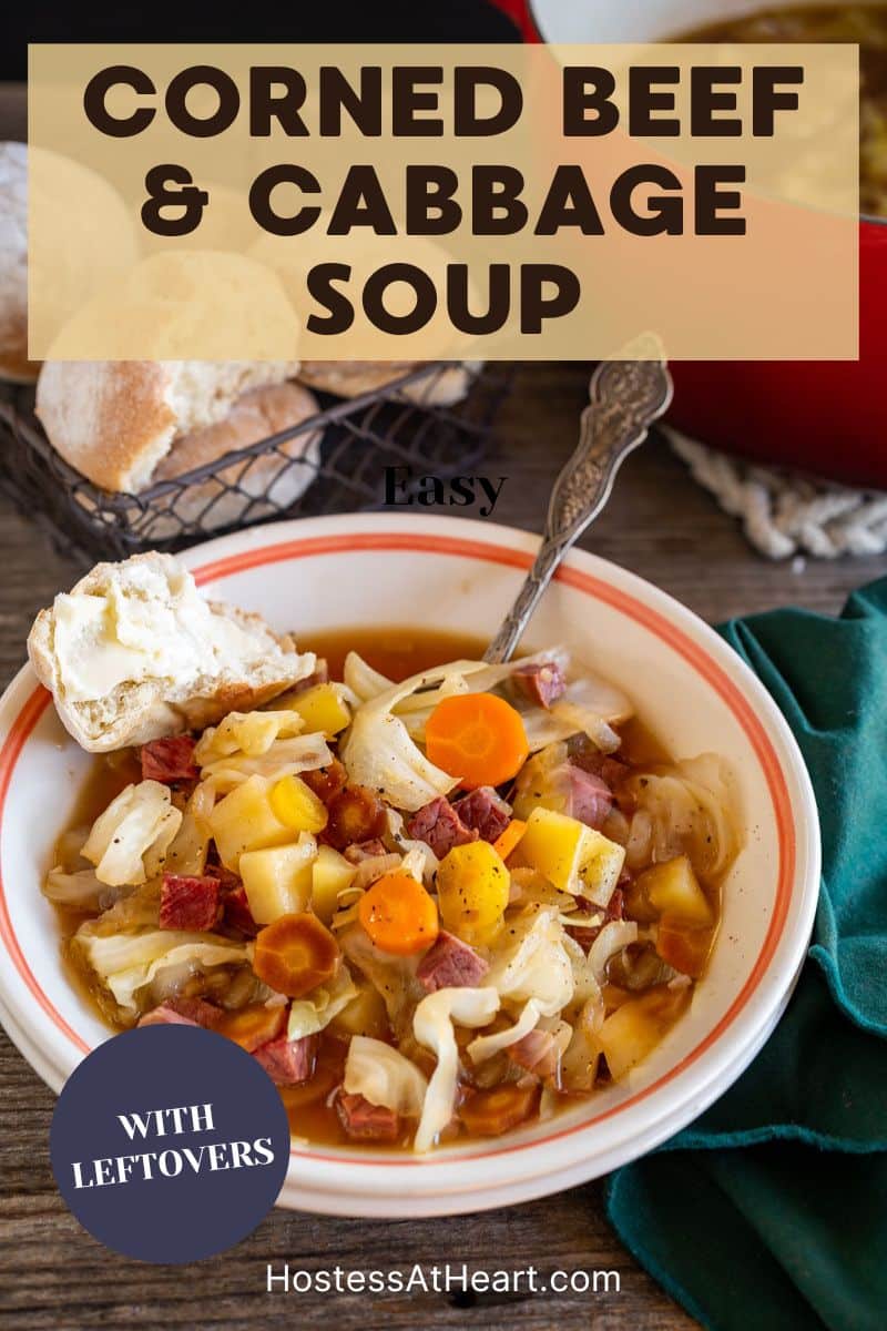 Top down view of a bowl of hearty soup loaded with corned beef, carrots, and cabbage. Hostess At Heart