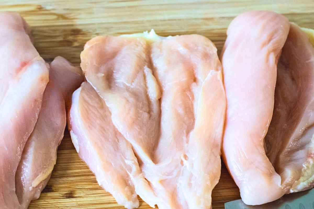 Chicken Breasts with pockets cut into them for stuffing - Hostess At Heart