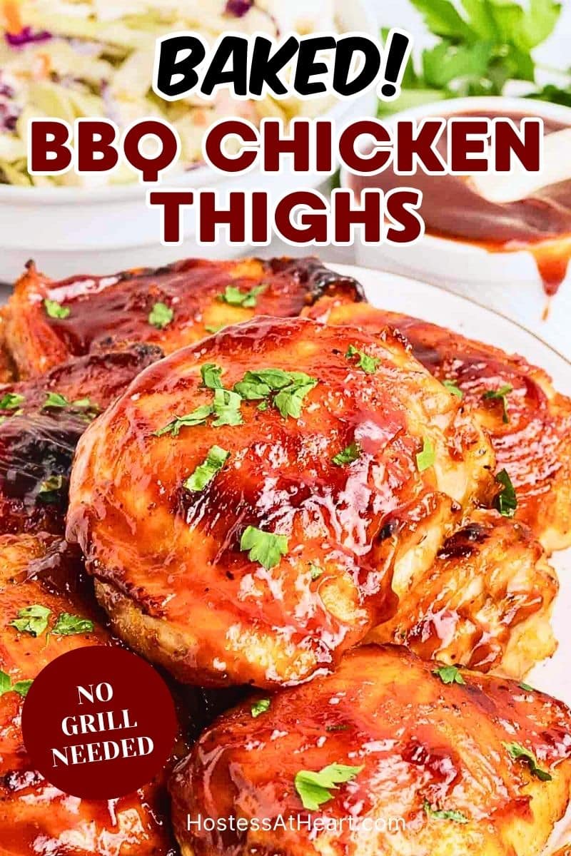 Titled image for Pinterest: Close up of juicy baked barbecue chicken thighs with sticky caramelized BBQ glaze. Hostess At Heart