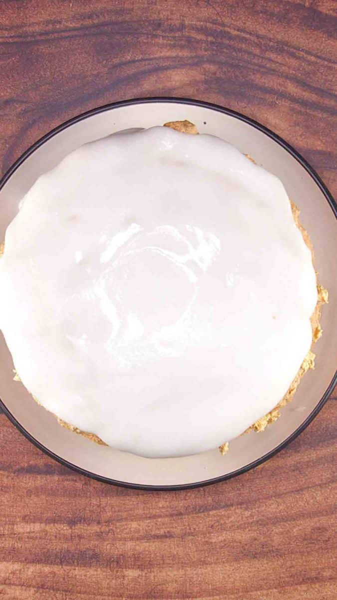 White icing spread over the top of an Esterhazy Cake. Hostess At Heart