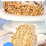 A titled image for Pinterest of a Side view of a slice of Esterhazy cake showing layers of hazelnut meringue and buttercream and the whole Esterhazy Torte on a cake plate behind the slice. Hostess At Heart