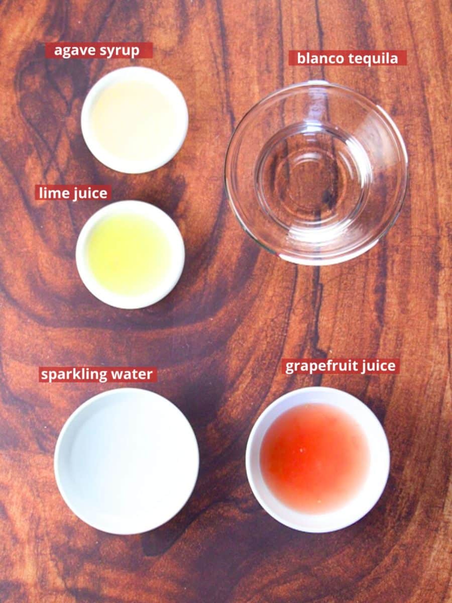 Paloma recipe ingredients: sparkling water, grapefruit juice, salt, lime juice, agave syrup, and blanco tequila. Hostess At Heart