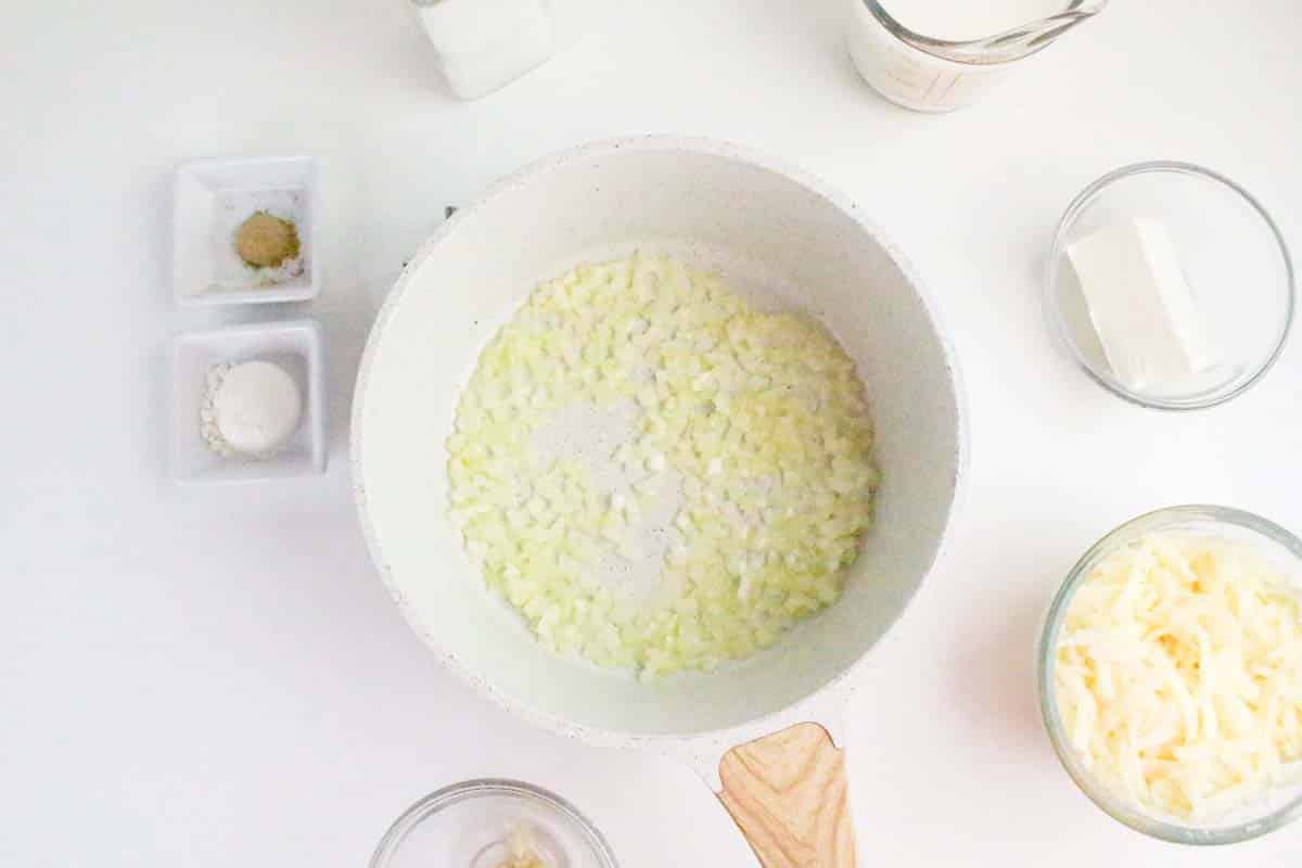 A dish filled with diced onion that's been cooked until soft and translucent. Hostess At Heart