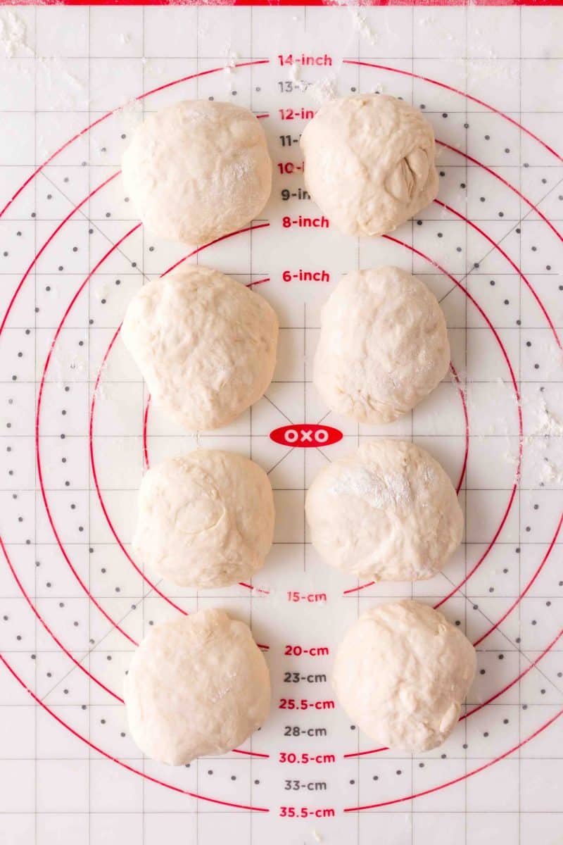 All purpose yeast dough separated into balls to make pretzel rolls. Hostess At Heart