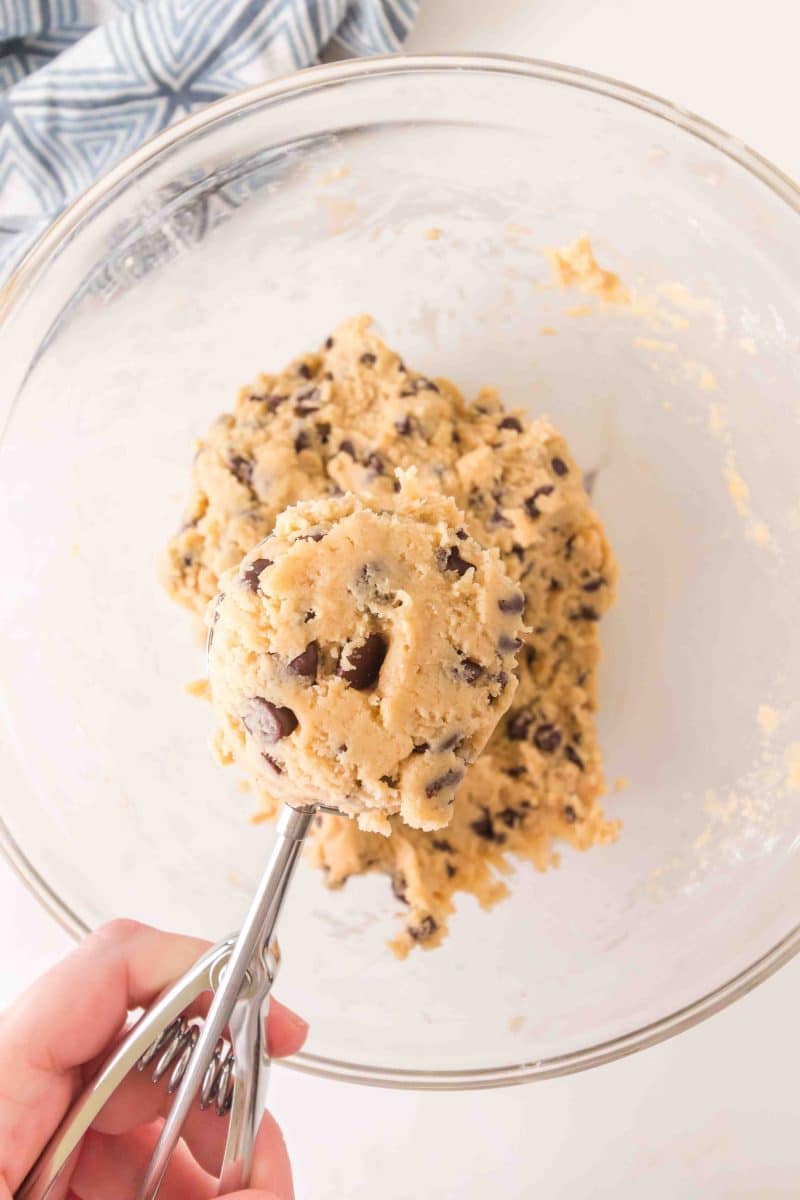 A large scoop filled with crumble chocolate chip cookie dough lifted from the mixing bowl. Hostess At Heart
