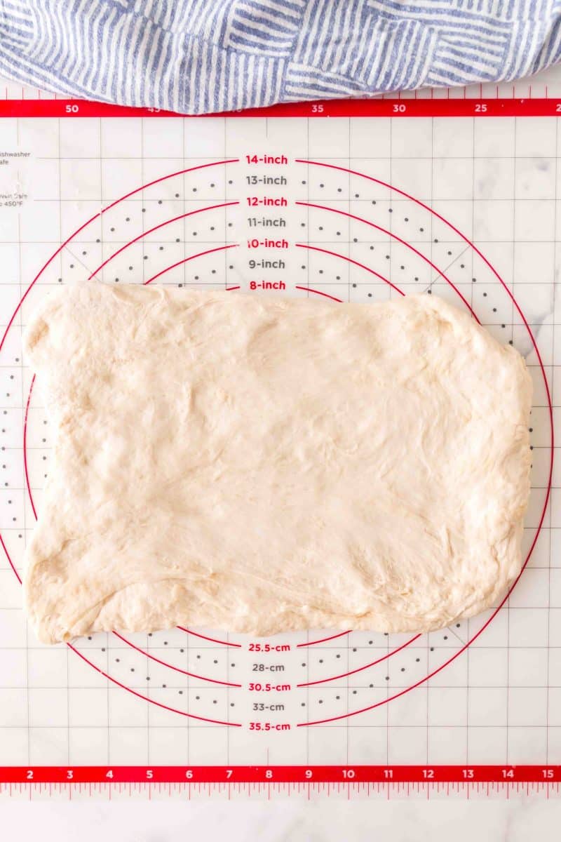 A rectangle of French bread dough before it's rolled into baguette log shapes &ndash; Hostess At Heart