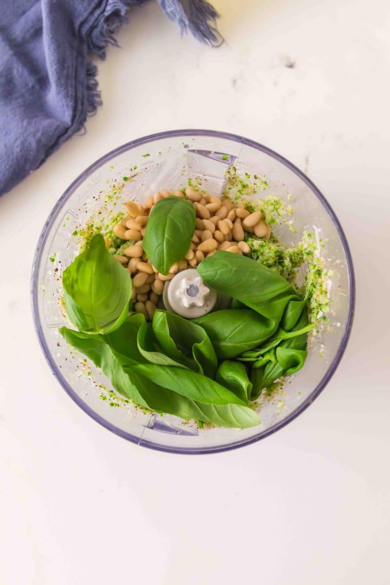 Fresh basil and pine nuts added to broccoli pesto in a food processor. Hostess At Heart