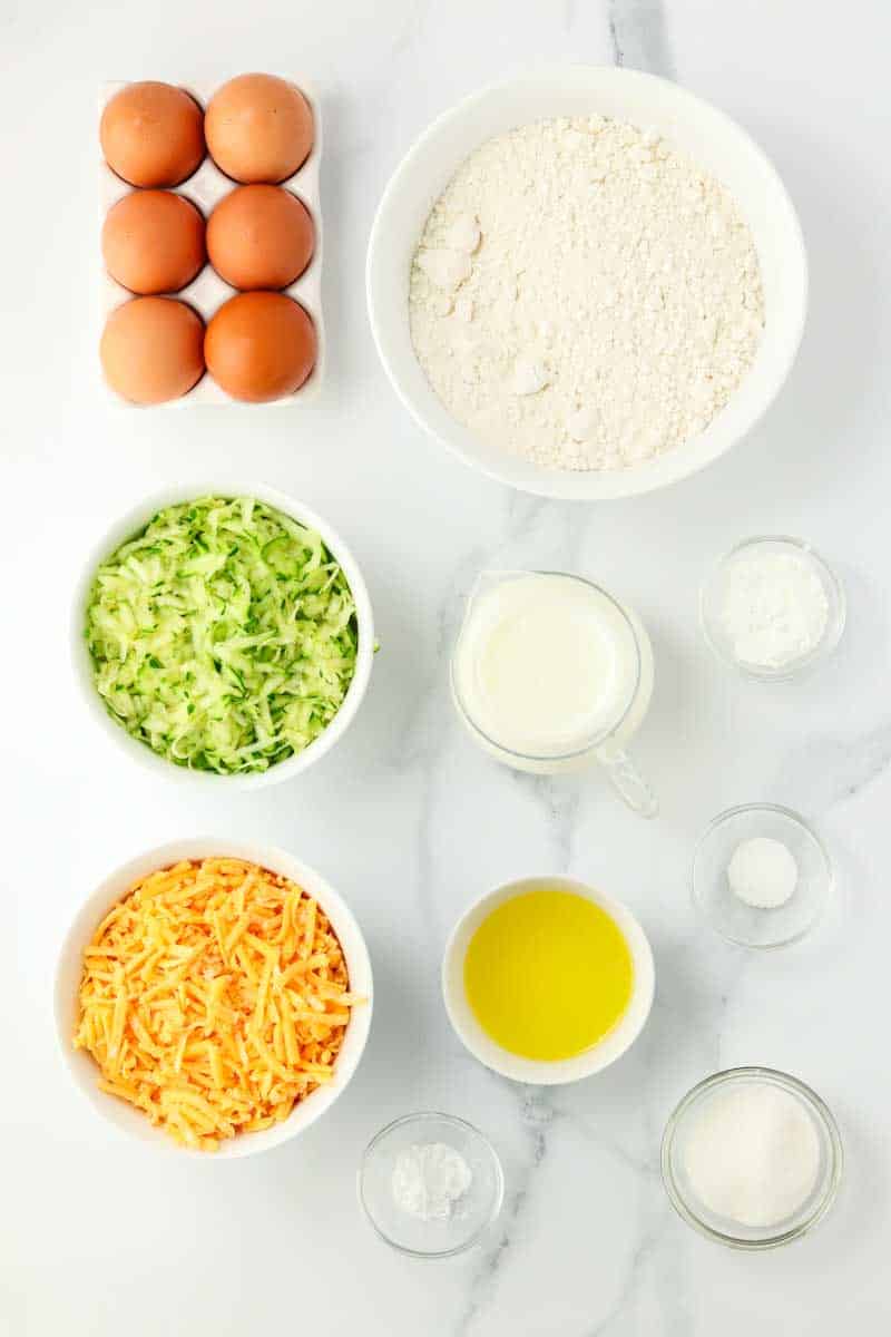 Zucchini Cheese Bread Recipe Ingredients: Flour, butter, cheese, shredded zucchini squash, buttermilk, eggs, sugar, salt, baking powder and baking soda. Hostess At Heart