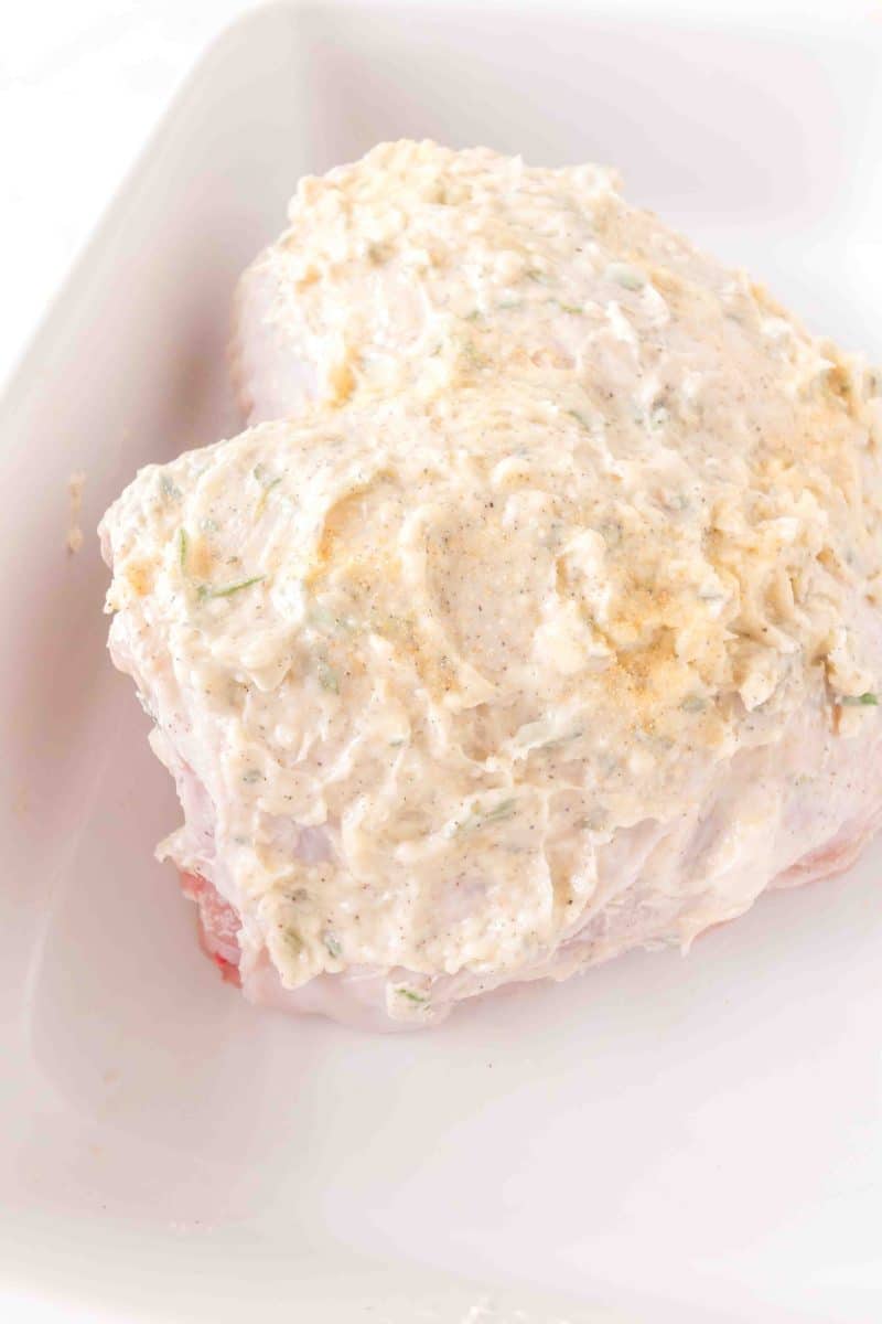 Turkey breast slathered with her butter in a baking dish. Hostess At Heart