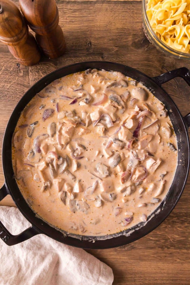 Creamy mushroom sauce cooking with sliced onions and mushrooms. Hostess At Heart