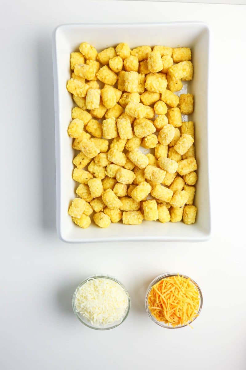Frozen tater tots in a casserole dish. Hostess At Heart