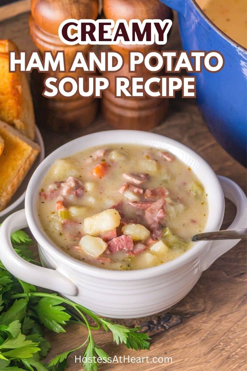 Close-up of a soup bowl filled with ham, potatoes, carrots and celery in creamy broth. Hostess At Heart